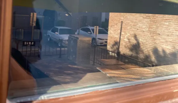 Retail storefront window cleaning in Scottsdale Arizona by The Window Knight