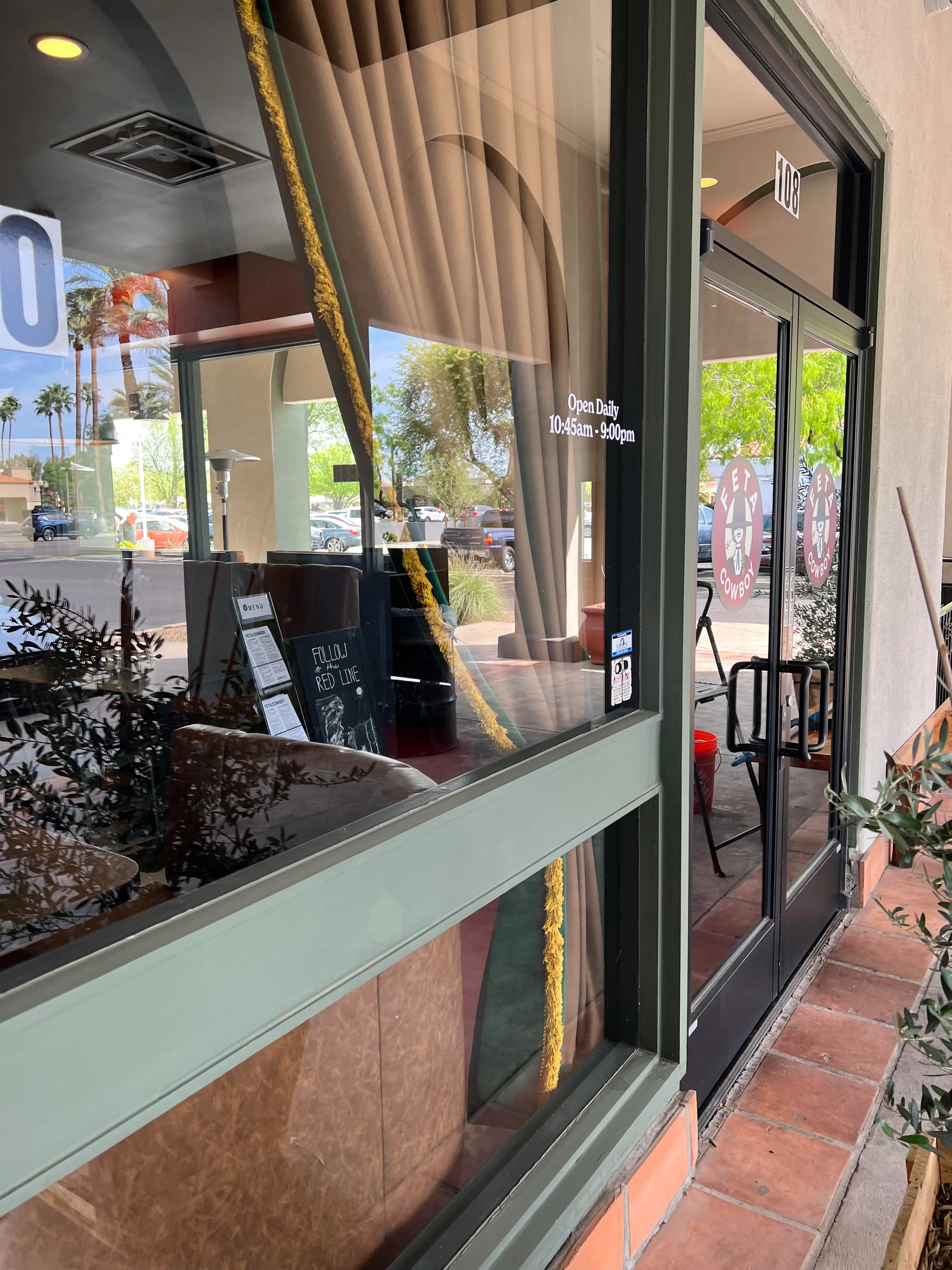 Feta Cowboy restaurant windows in Tempe Arizona before storefront glass cleaning